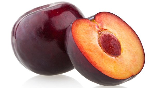 one whole organic plum and one cut